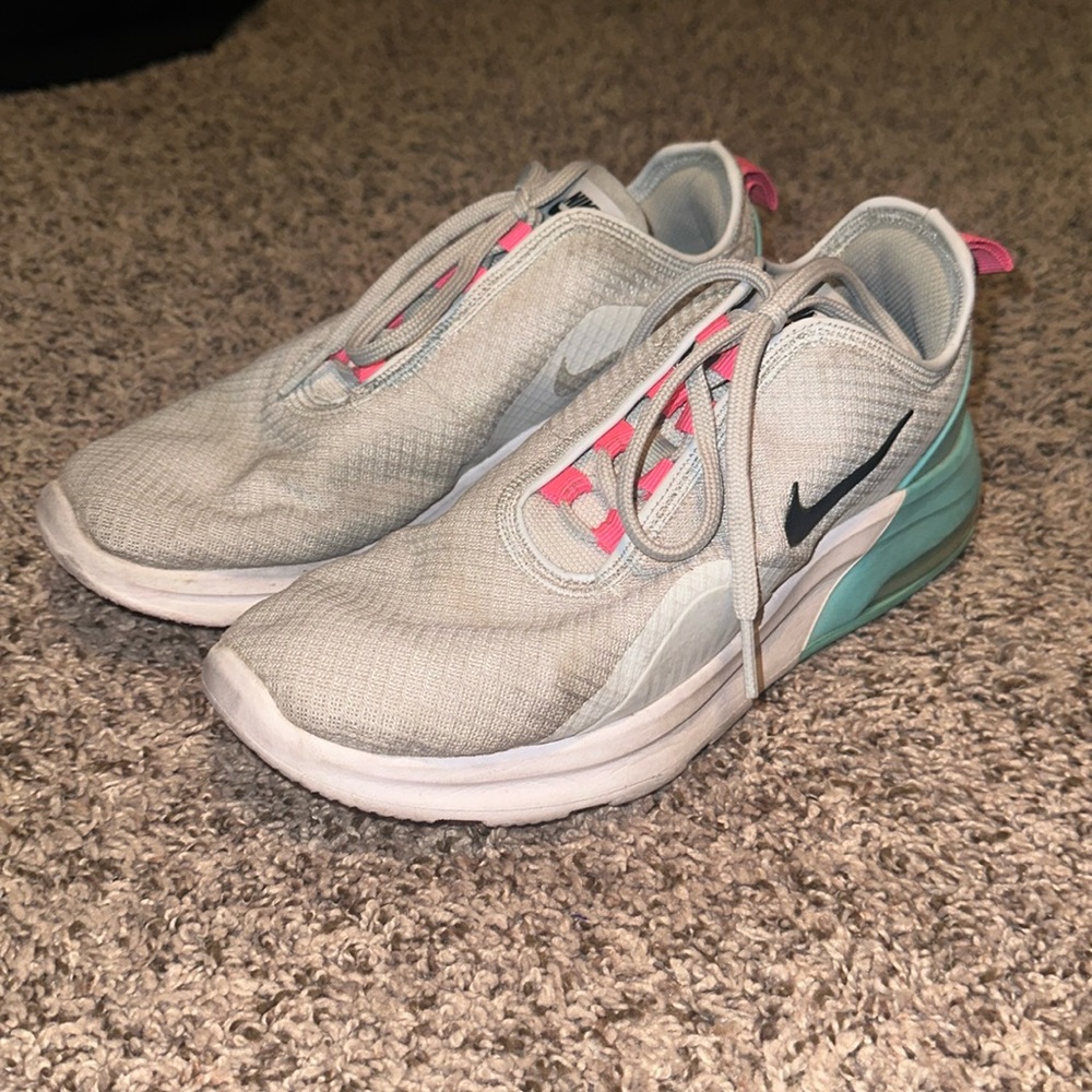 Nike, No longer wear them. They are cute and comfy though.